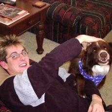 A pet owner named Austin with his brown and white boarder collie